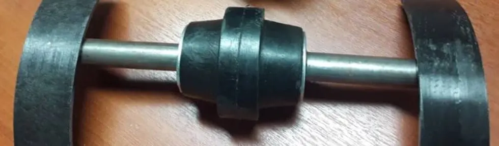 Ejes con rolos de retorno: una mejora clave para transportadores Redler. Imagen destacada sobre ejes con rolos de retorno. publicada en Noticias Web